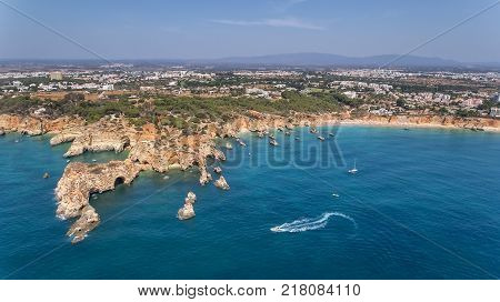 Aerial. Rocky beach shores of Portimao. Algarve Portugal