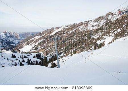 The cable car in the snowy mountains Chimbulak photo for you