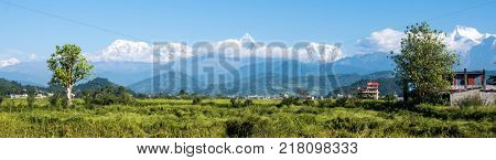 Panoramic view on beutiful Nepalese nature and Annapurna mountain range.