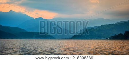 Panoramic view of Phewa lake and silhouette of mountains on the background, Nepal