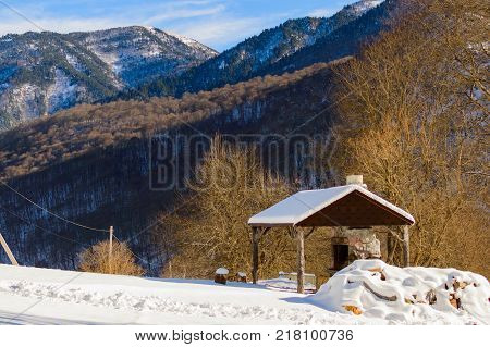 Winter mountain landscape with rocks and snow in Russia
