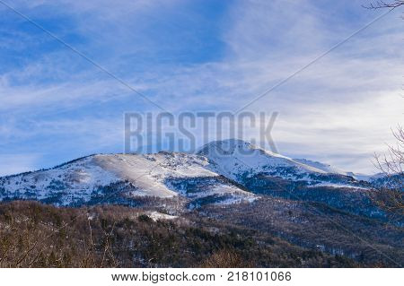 Winter mountain landscape with rocks and snow in Russia