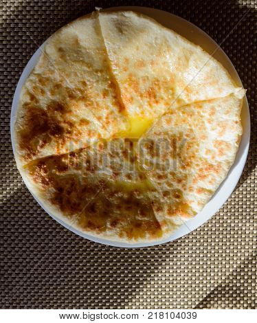 Hychin bread pie with potato stuffing. Traditional Caucasian cuisine - hot Ossetian pie.