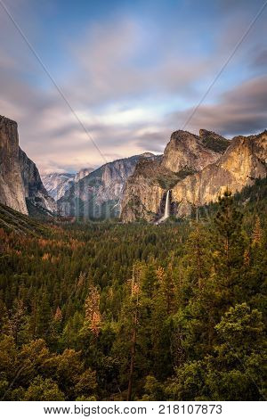 Yosemite Valley and Bridalveil Fall at sunset from tunnel view, California. Long exposure.