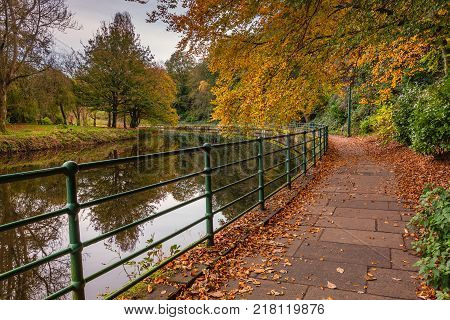 Autumn Walk along River Wansbeck, as it passes through the centre of the market town of Morpeth in Northumberland