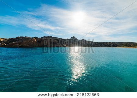 Sun shining over Spalmatore shore in Sardinia
