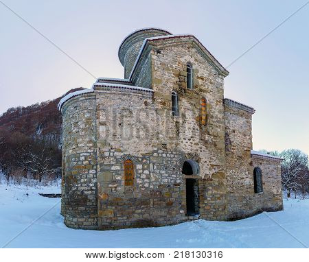 North Caucasus. Lower-Arkhyz settlement. Abandoned orthodox temple. Winter landscape