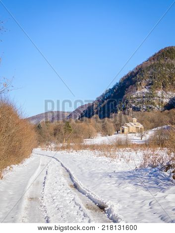 North Caucasus. Lower-Arkhyz settlement. Abandoned orthodox temple. Winter landscape