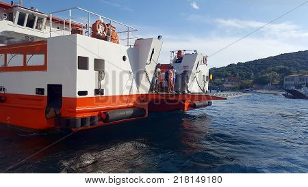 Lepetani Montenegro - August 232016: Ferry boat is floating over the sea and transfer passenger or tourist between Kamenari and Lepetani
