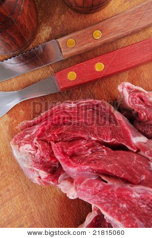 beef fillet on plate with cutlery served before cooking