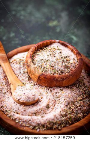 Himalayan salt with dried herbs. Aromatic spices. Selective f ocus