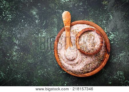 Himalayan salt with dried herbs. Aromatic spices. Selective f ocus