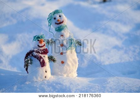 Little small Snowman in snow with copy space