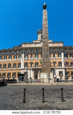 ROME, ITALY - JUNE 23, 2017: Amazing view Obelisk of Montecitorio and Palazzo Montecitorio in city of Rome, Italy
