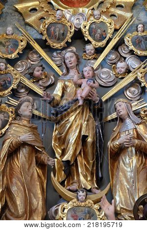 BELEC, CROATIA - JULY 09: The altar of Holy Rosary in the Baroque Church of Our Lady of the Snow in Belec, Croatia on July 09, 2016.