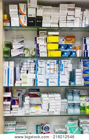 SIDE, TURKEY - 4 OCTOBER , 2017: Pharmacy cabinets with medicines and drugs tablets and food additives