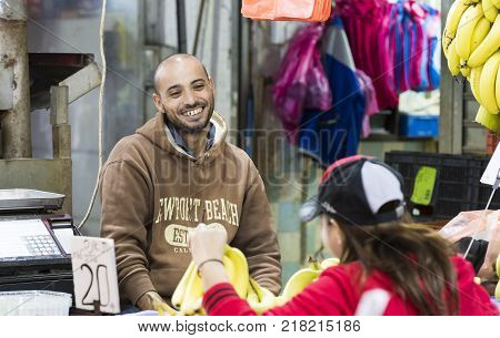 TEL AVIV , ISRAEL - 21 NOVEMBER 2017: Sellers on the old grocery street Nahalat-Benjamin