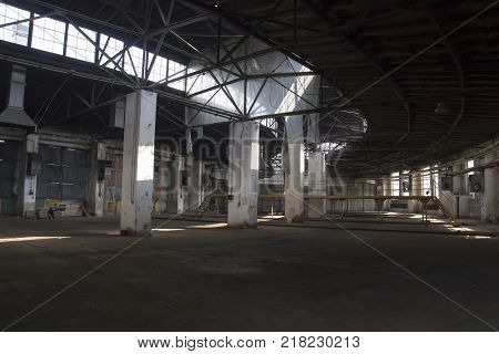 An old empty abandoned factory warehouse on the inside