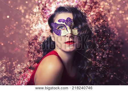 Beautiful Woman Holdind A Carnival Mask. Halloween Holiday Concept.