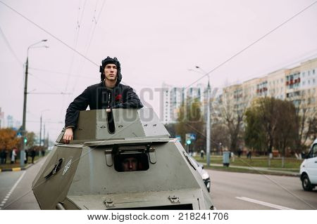 Gomel, Belarus - November 26, 2016: Reenactors In The Form Of Soldiers Of Soviet Red Army On In Armored Car BA-64 On Celebration For The Century Of October Revolution.