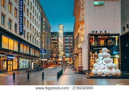 Helsinki, Finland - December 8, 2016: New Year Lights Xmas Christmas Decorations And Festive Illumination In Kluuvikatu Street. Winter Christmas Xmas Holiday Season