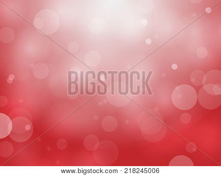 Abstract red bokeh circles and light on red background using for Christmas or Happy new year background festive background with defocused light.