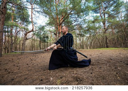 Man In A Traditional Armor Is Practicing Martial Arts, Kendo