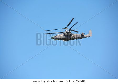Military helicopters against the blue sky. Helicopter in flight