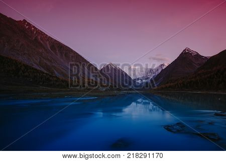 View from lake Akkem on mountain Belukha near board between Russia and Kazakhstan during golden autumn