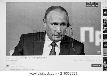 PARIS FRANCE - DEC 14 2017: Youtube live channel of Rossiya RTR the Russian President Vladimir Putin give final media Q&A before March election - listening to foreign journalists translation