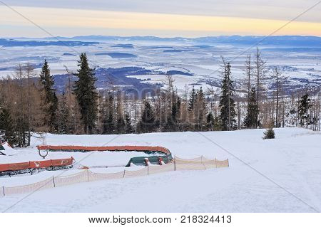 View of a blue plateau from a ski and hiking Hrebienok resort (altitude 1285 m.) located in the High Tatras mountains National park. Slovakia.