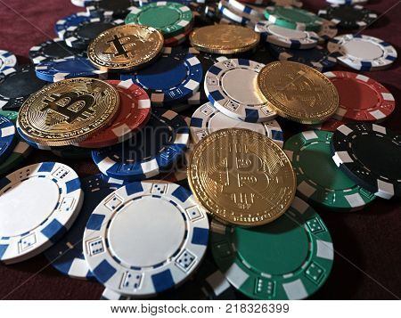 Bitcoin coins and poker chips. New virtual and real currency. The concept of replacement bitcoin in all forms of payment.
