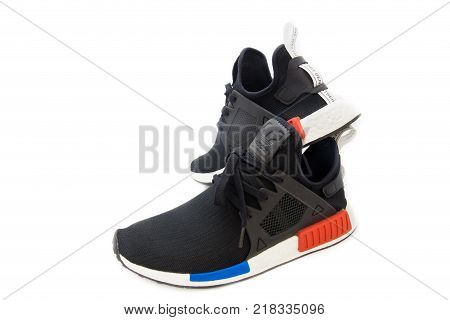 BANGKOK, THAILAND - AUGUST 11, 2017: Adidas NMD XR1 OG shoes isolated on white background in studio most popular fashion in year 2017, process color.