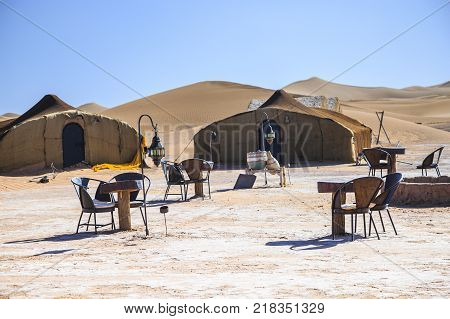 Ait Saoun Morocco - February 22 2016: Breakfast arrangement in hotel in Ait Saoun desert of Moroccos with multiple seating arrangement.