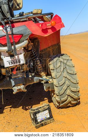 Ait Saoun Morocco - February 23 2016: Atv RZR800 standing stationary in Ait Saoun desert in Morocco for battery replacement.
