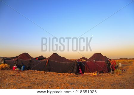 Merzouga Morocco - February 25 2016: Merzouga desert landscape with its traditional jaima. Merzouga is famous for its dunes the highest in Morocco.