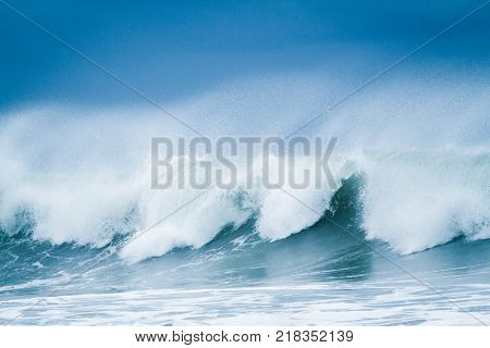 Sea water background. Beautiful breaking waves in the sea.