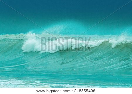 Sea water background. Beautiful breaking waves in the sea.