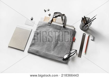 Blank stationery set and gray bag at white paper background. Template for branding identity. Responsive design mockup for placing your design.