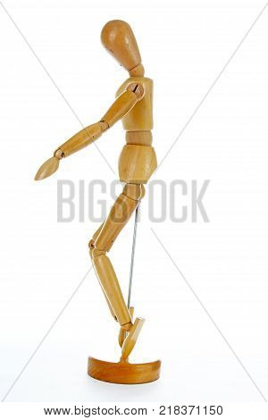 Wooden mannequin drawing model human shape. Doll human body figurine statue pose posing to illustrate human body positures for draw class or every concept. Body statue.