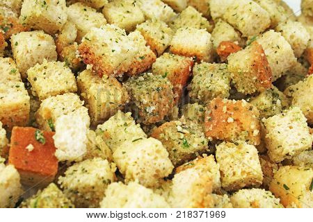 Crouton croutons as background texture. Closeup background. Food photo. Bread croutons.