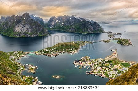 Mountains and  Reine in Lofoten islands, Norway viewed from the Mt. Reinebringen