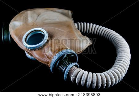 Vintage European  gas mask isolated on black background