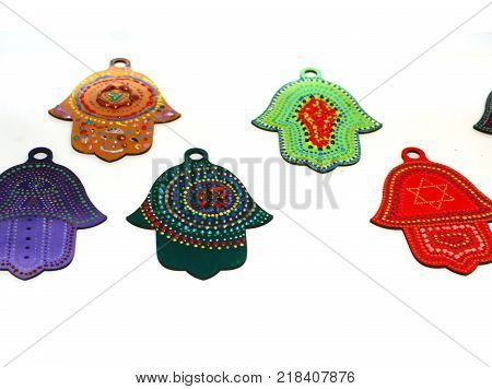 Decorated multi-colored hand hamsa. Beautiful Spot Painting