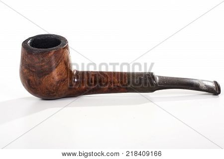 Wooden tobacco pipe on isolated white studio background. Closeup photo. Clipping path. Easy to use. White background. Cutout cut out.
