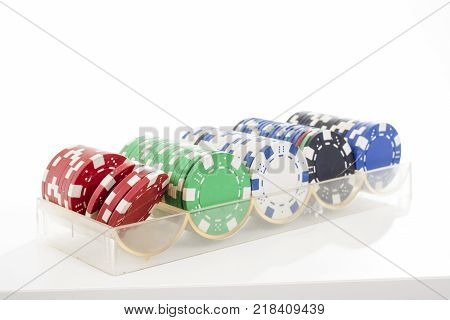 Poker casino coins token tokens on isolated white studio background. Closeup photo. Clipping path. Easy to use. White background. Cutout cut out.