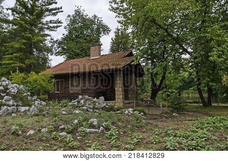 Wooden house  in National monument of landscape architecture Park museum Vrana in former time royal palace on the outskirts of Sofia, Bulgaria, Europe