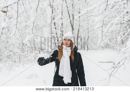 Beautiful Young Girl In A White Winter Forest