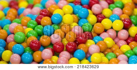 Background of multi- colored round sweet candies