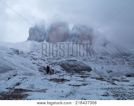 Tre Cime di Lavaredo in beautiful surroundings in the Dolomites at foggy winter weather in Italy Europe (Drei Zinnen)